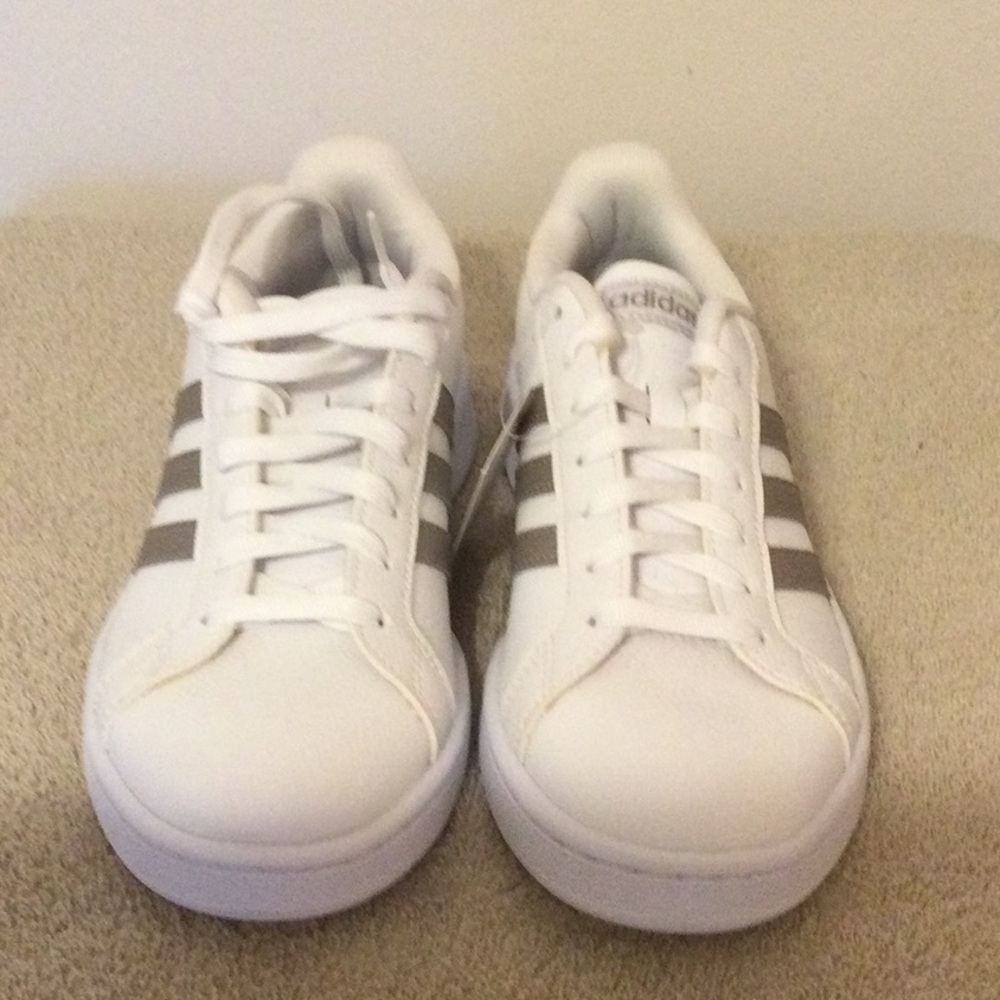 Adidas tennis shoes.